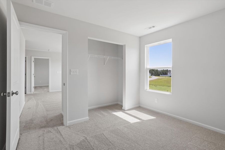 Spacious, unfurnished interior of a new home in Cambridge Reserve, Angier (Image 26).