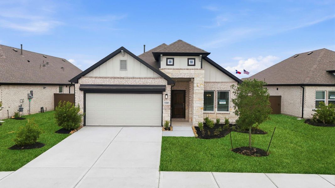 Front exterior of a new home in Creekhaven, Iowa Colony, TX, highlighting curb appeal (Image 2). Front exterior of a new home in Creekhaven, Iowa Colony, TX, highlighting curb appeal (Image 2).