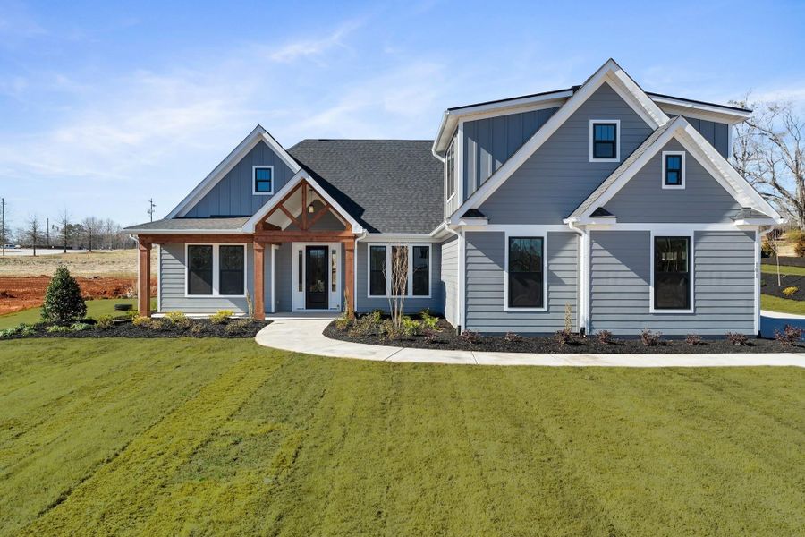 Front exterior of a new home in Horry County Homes, Conway, SC, highlighting curb appeal (Image 1). Front exterior of a new home in Horry County Homes, Conway, SC, highlighting curb appeal (Image 1).