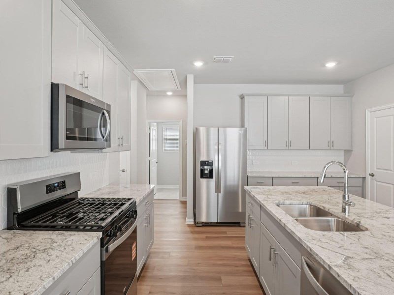Photo is not of the actual home, but is an inspirational photo of builder’s model home and may depict options, furnishings, and/or decorator features that are not included Photo is not of the actual home, but is an inspirational photo of builder’s model home and may depict options, furnishings, and/or decorator features that are not included