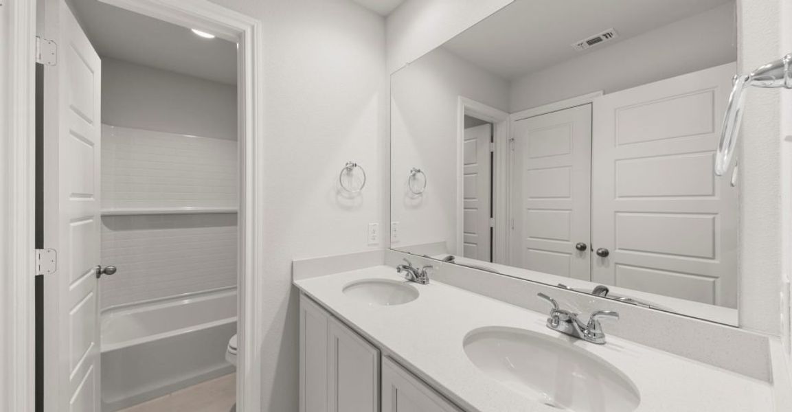 Representative exterior photo of a completed home built from the Raleigh by Impression Homes in Baker Farms, Cleburne, TX (Image 16).