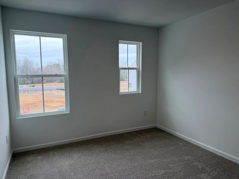 Bed 2 - Neutral tones and clean lines with modern comfort.