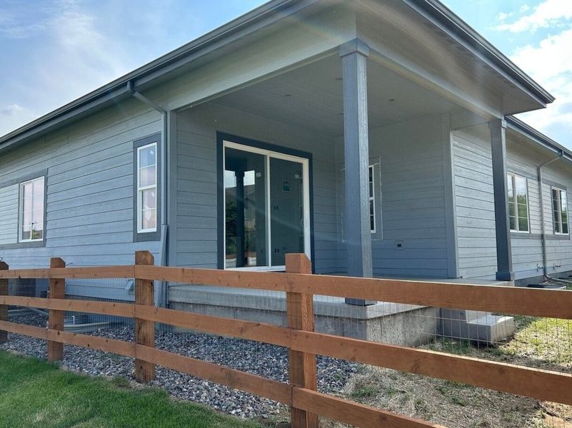 Front exterior of a new home in Westside Crossing Paired Homes, Berthoud, CO, highlighting curb appeal (Image 2). Front exterior of a new home in Westside Crossing Paired Homes, Berthoud, CO, highlighting curb appeal (Image 2).