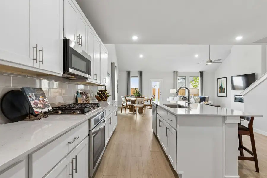 Kitchen in a Madero Winters Model Home in Haslet TX by Trophy Signature Homes