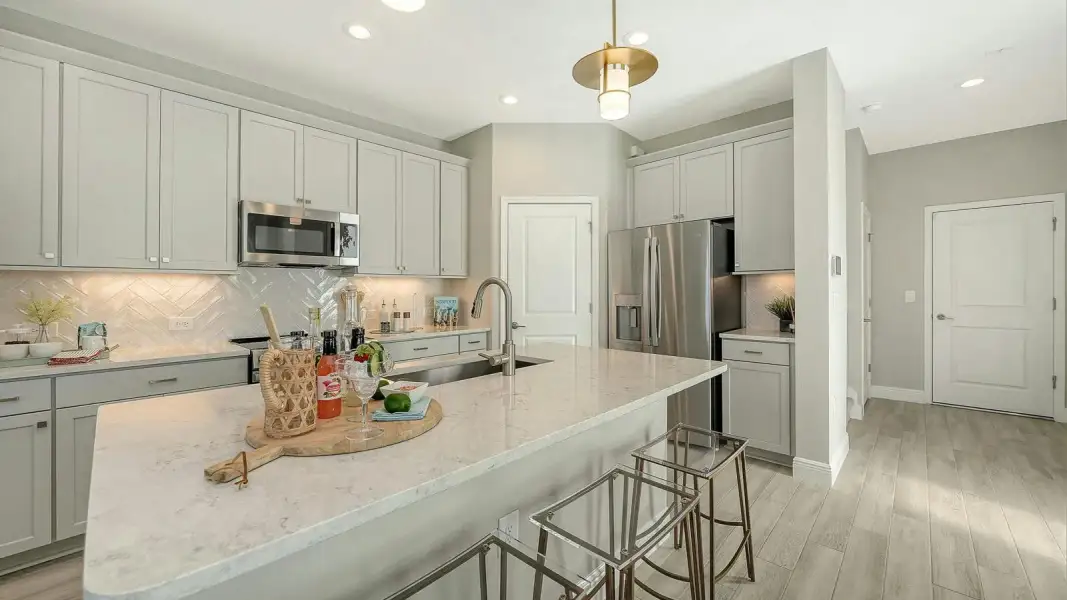 Furnished interior view inside a new home in SkySail Real Estate and Homes for Sale in Naples, FL - Neal Communities, Naples (Image 10).
