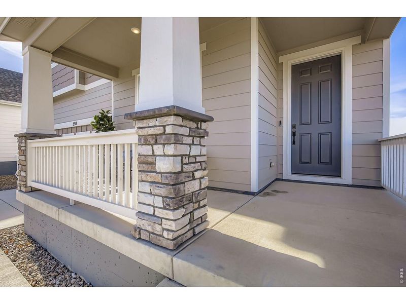 Exterior details and patio area of a home in Farmstead, Berthoud (Image 25).