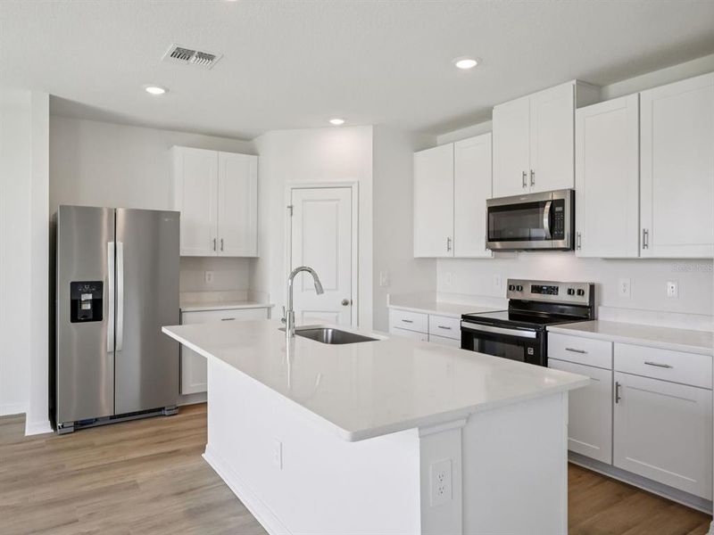 Furnished interior view inside a new home in Oakfield Trails - Premier Series, Parrish (Image 10).