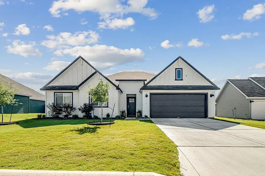 Front exterior of a new home in , Fredericksburg, TX, highlighting curb appeal (Image 1). Front exterior of a new home in , Fredericksburg, TX, highlighting curb appeal (Image 1).