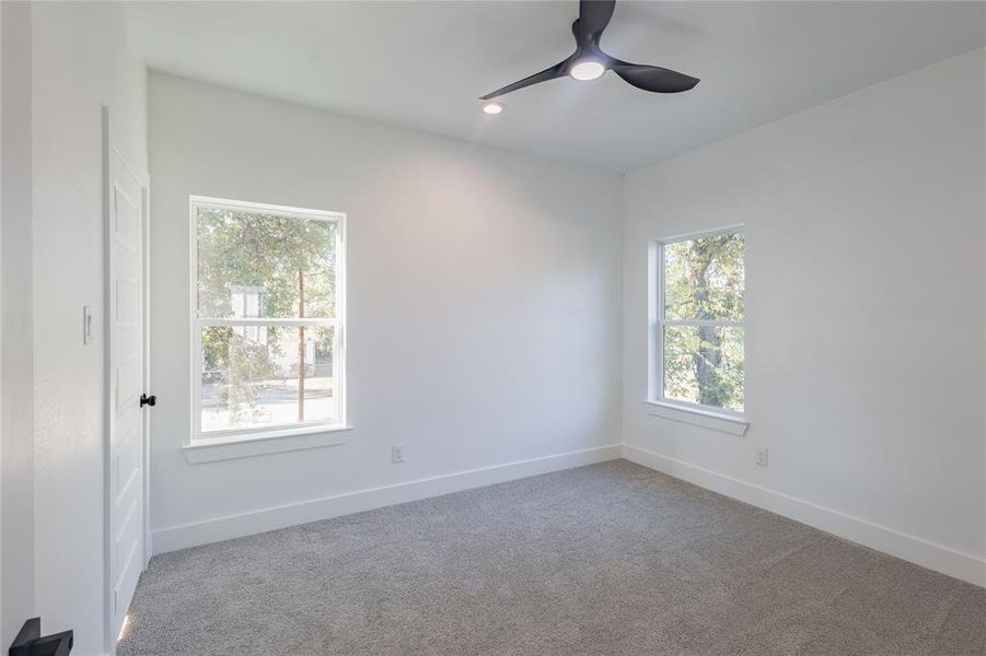 3rd Bedroom with carpet, a ceiling fan, and recessed lighting 3rd Bedroom with carpet, a ceiling fan, and recessed lighting