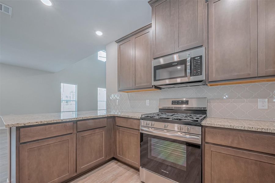 Furnished interior view inside a new home in Sunterra, Katy (Image 9). Furnished interior view inside a new home in Sunterra, Katy (Image 9).