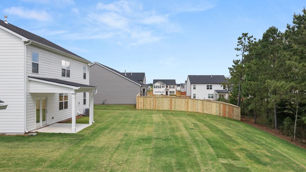 Exterior details and patio area of a home in Preserve at Dove Creek, Statham (Image 21). Exterior details and patio area of a home in Preserve at Dove Creek, Statham (Image 21).