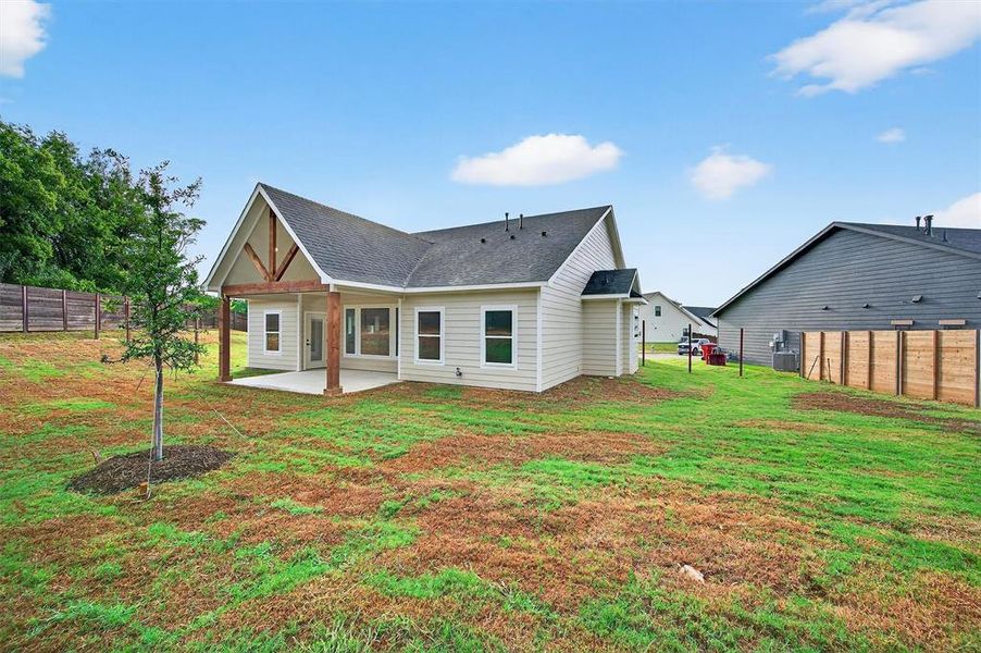 Front exterior of a new home in , Sherman, TX, highlighting curb appeal (Image 21).