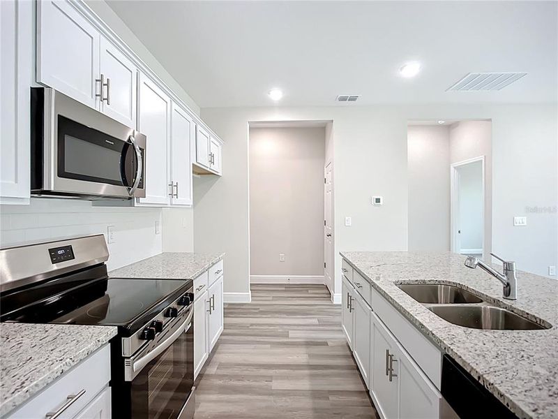Furnished interior view inside a new home in , North Port (Image 6).