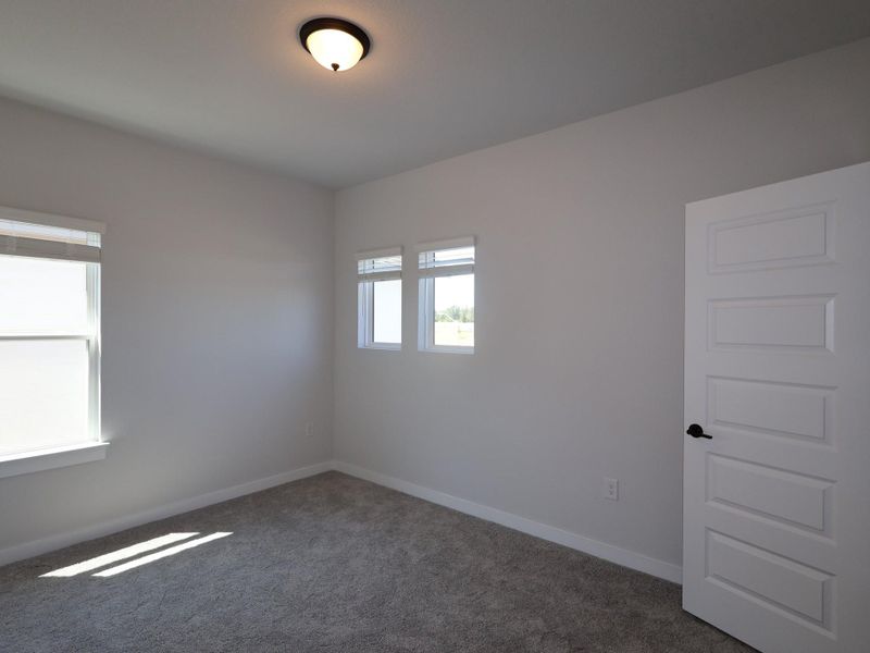 Spacious, unfurnished interior of a new home in Cedar Brook, Leander (Image 33).