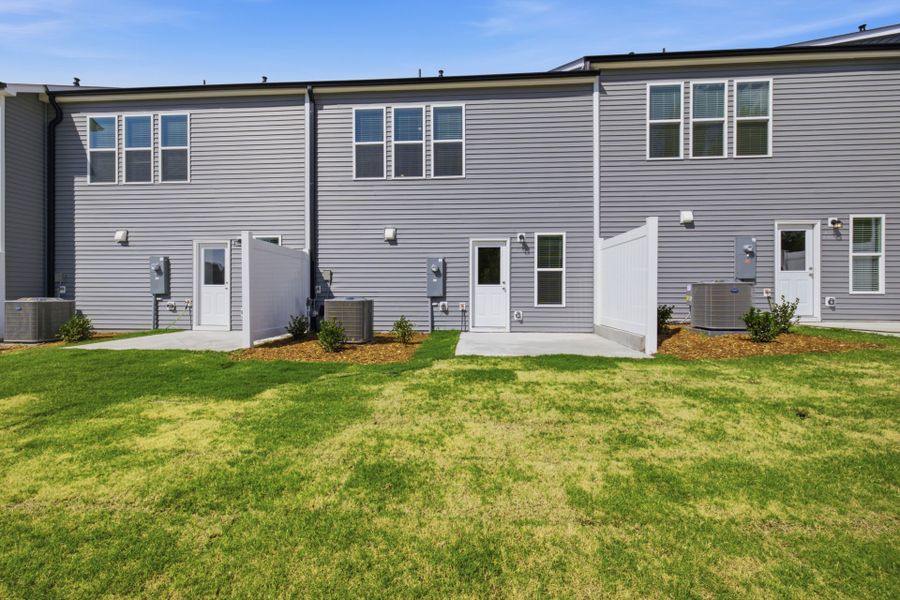 Exterior details and patio area of a home in Carpenter Falls, Durham (Image 3).