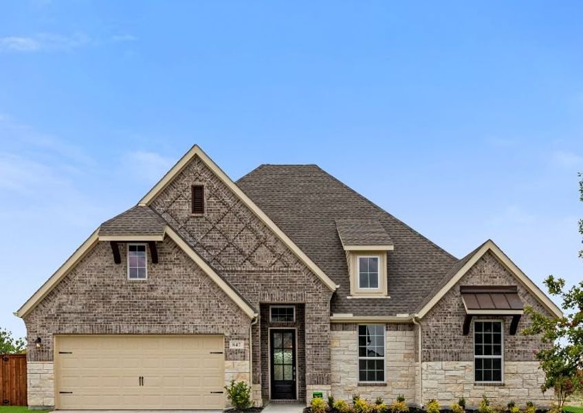 Representative exterior photo of a completed home built from the Jackson by UnionMain Homes in Cambridge Crossing, Celina, TX (Image 22).
