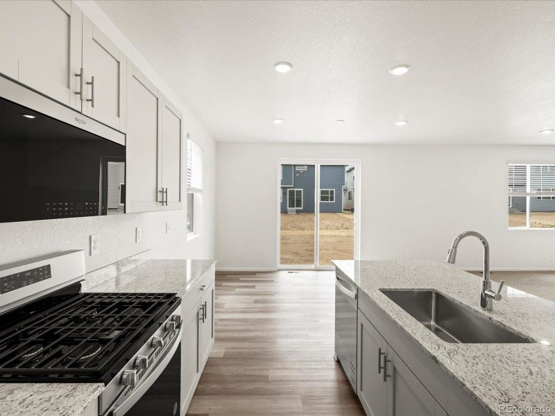 Furnished interior view inside a new home in Ridgeline Vista: The Flora Collection, Brighton (Image 11).