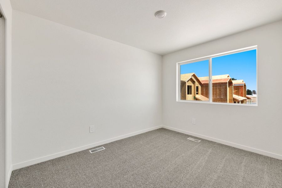 Representative unfurnished interior of a home built from the Pinecliffe by Baessler Homes in Liberty Draw, Evans (Image 15).