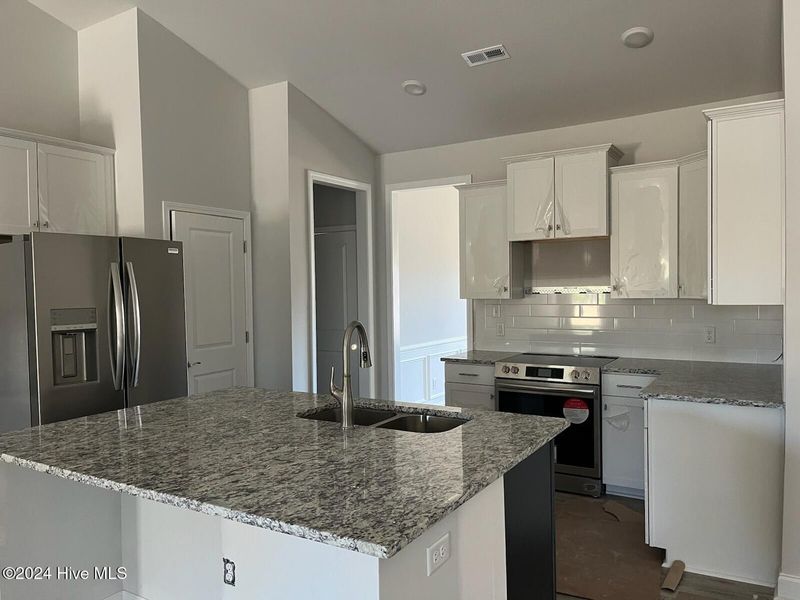Furnished interior view inside a new home in Palmetto Creek, Bolivia (Image 3).