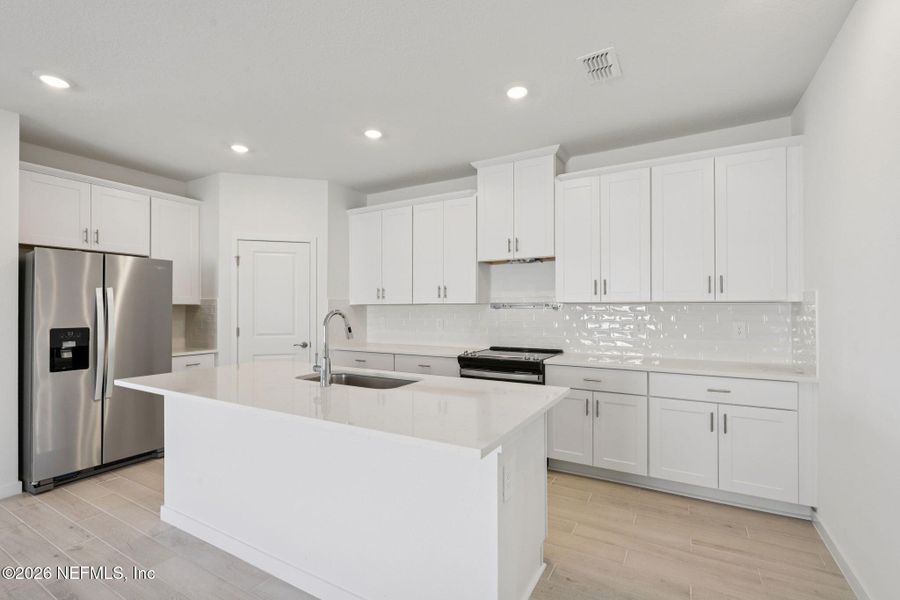 Furnished interior view inside a new home in Colbert Landings, Palm Coast (Image 12).