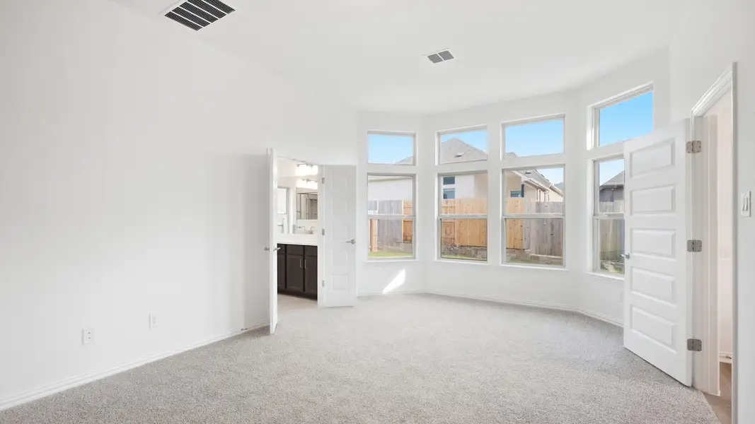 Furnished interior view inside a new home in Sunfield, Buda (Image 10).