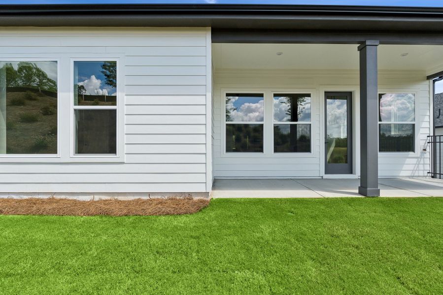 Exterior details and patio area of a home in Lanier Landing - Retreat Collection, Gainesville (Image 3).