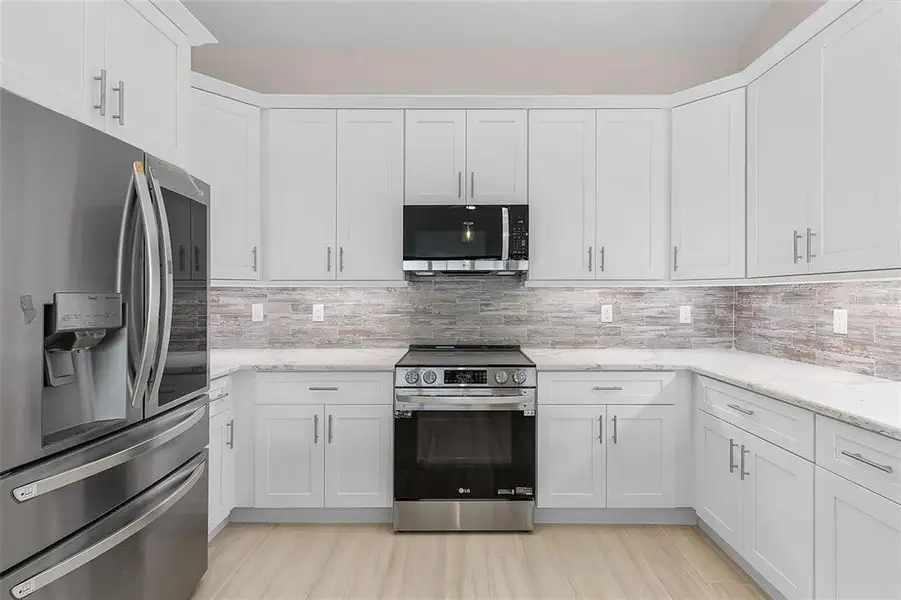 Furnished interior view inside a new home in , Punta Gorda (Image 4).