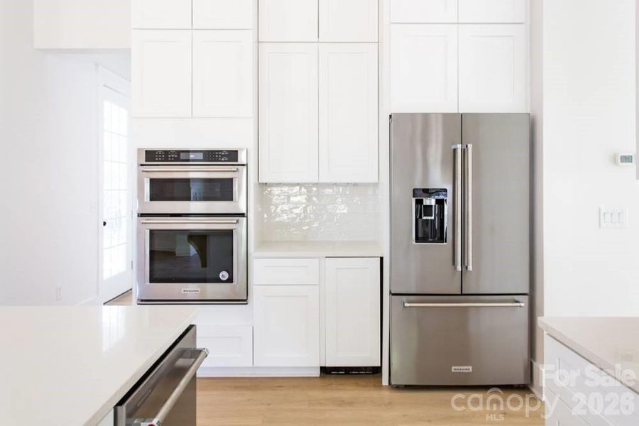 Furnished interior view inside a new home in , Weddington (Image 9).