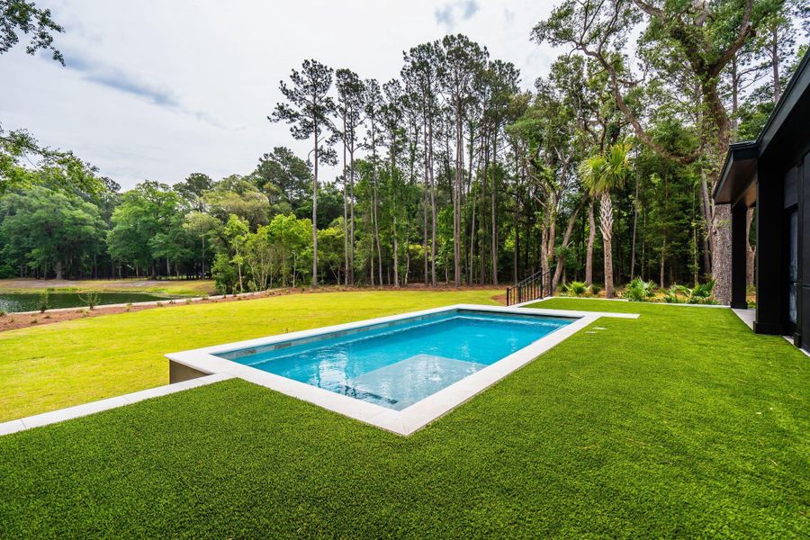 Exterior details and patio area of a home in , Johns Island (Image 48).
