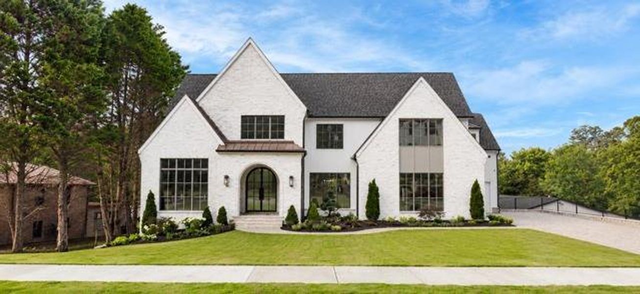 Front exterior of a new home in , Roswell, GA, highlighting curb appeal (Image 29). Front exterior of a new home in , Roswell, GA, highlighting curb appeal (Image 29).