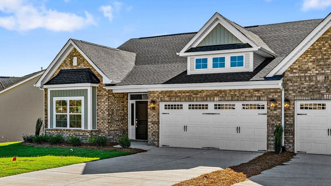 Front exterior of a new home in Fieldstone, Lexington, NC, highlighting curb appeal (Image 2).
