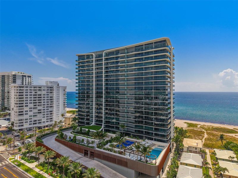 Front exterior of a new home in Casamar, Pompano Beach, FL, highlighting curb appeal (Image 28). Front exterior of a new home in Casamar, Pompano Beach, FL, highlighting curb appeal (Image 28).