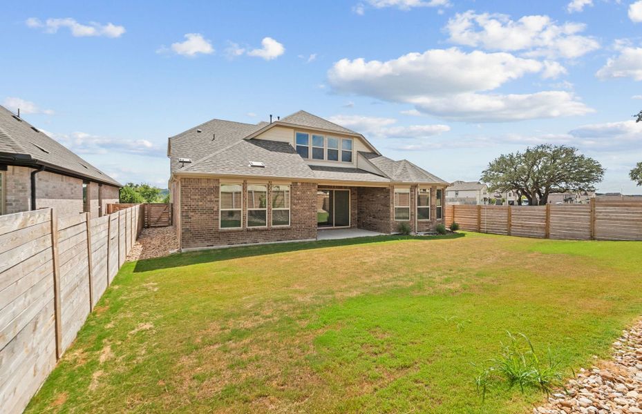 Exterior details and patio area of a home in Bluffview Reserve, Leander (Image 25).