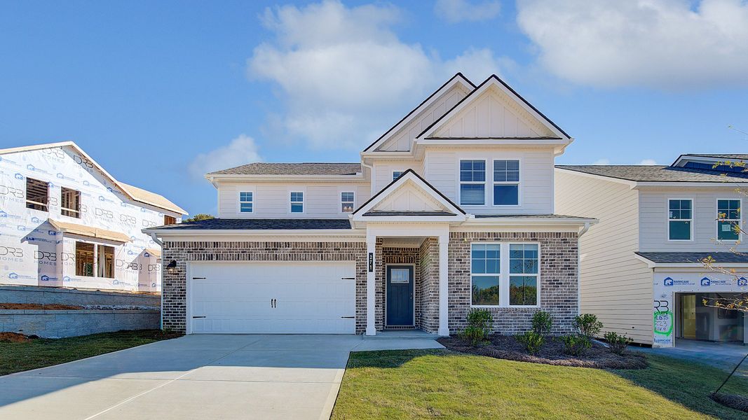 Representative exterior photo of a completed home built from the Wynwood by DRB Homes in Abbotts Crossing, Conyers, GA (Image 25).