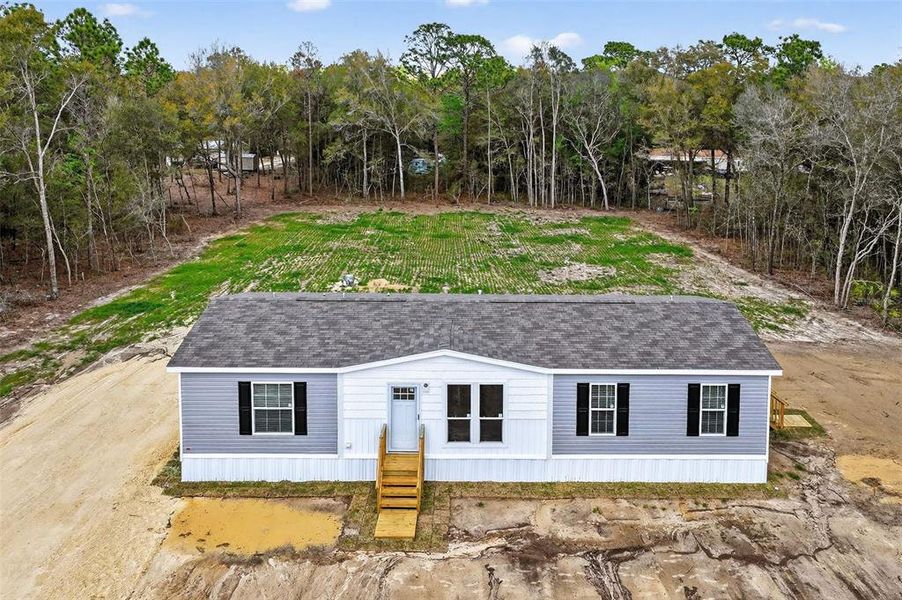 Exterior details and patio area of a home in , Ocala (Image 23).