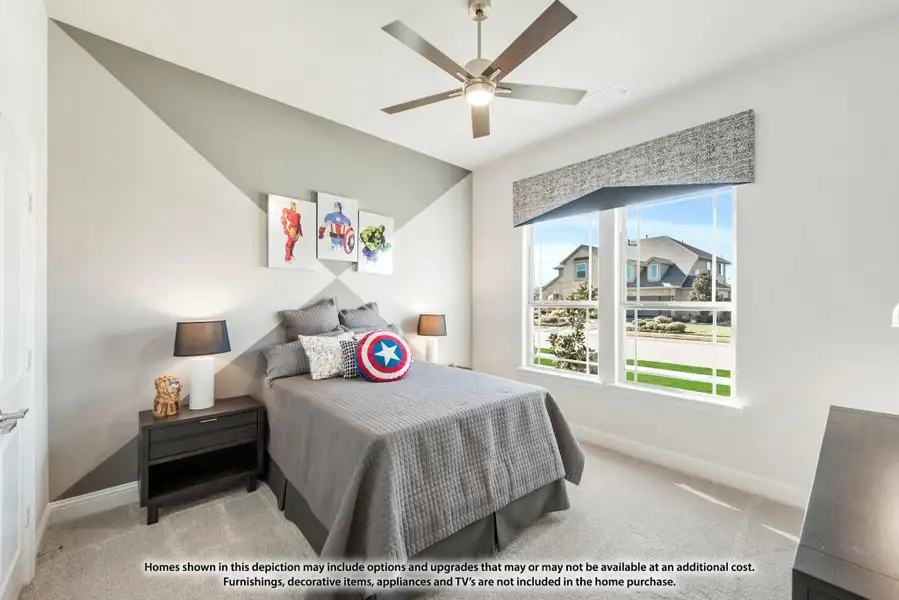 Children's bedroom with vaulted ceiling, ceiling fan, geometric accent wall, and large window with neighborhood view. Children's bedroom with vaulted ceiling, ceiling fan, geometric accent wall, and large window with neighborhood view.