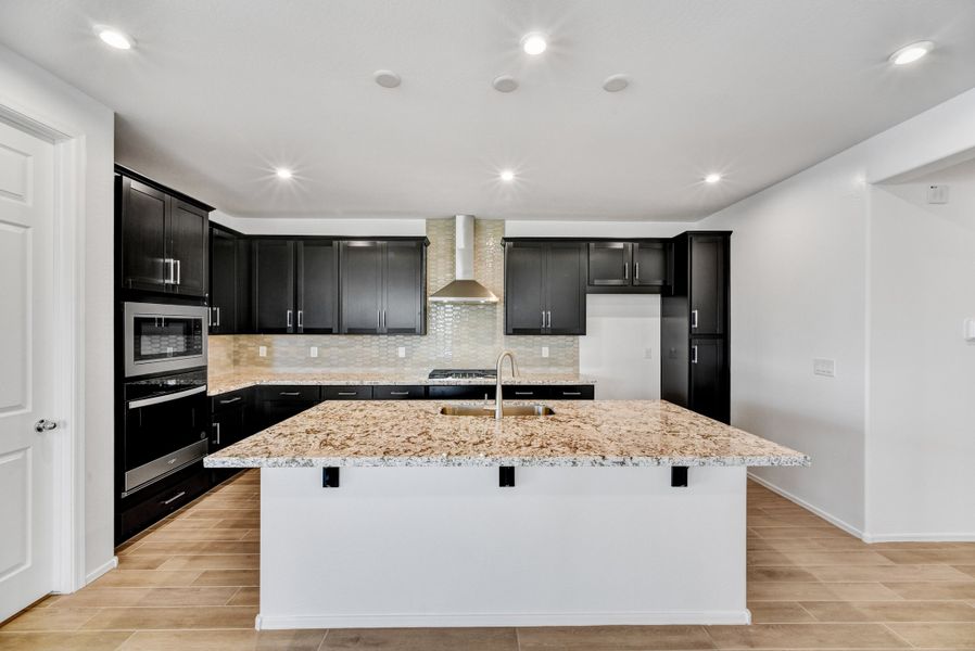 Furnished interior view inside a new home in Marbella at Windrose, Waddell (Image 8).