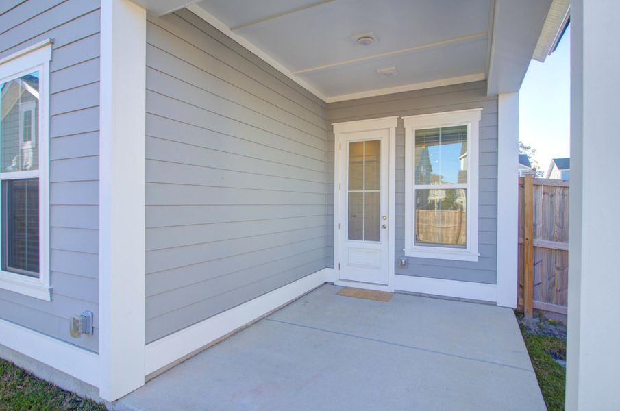 Exterior details and patio area of a home in Carnes Crossroads: Row Collection, Summerville (Image 21). Exterior details and patio area of a home in Carnes Crossroads: Row Collection, Summerville (Image 21).