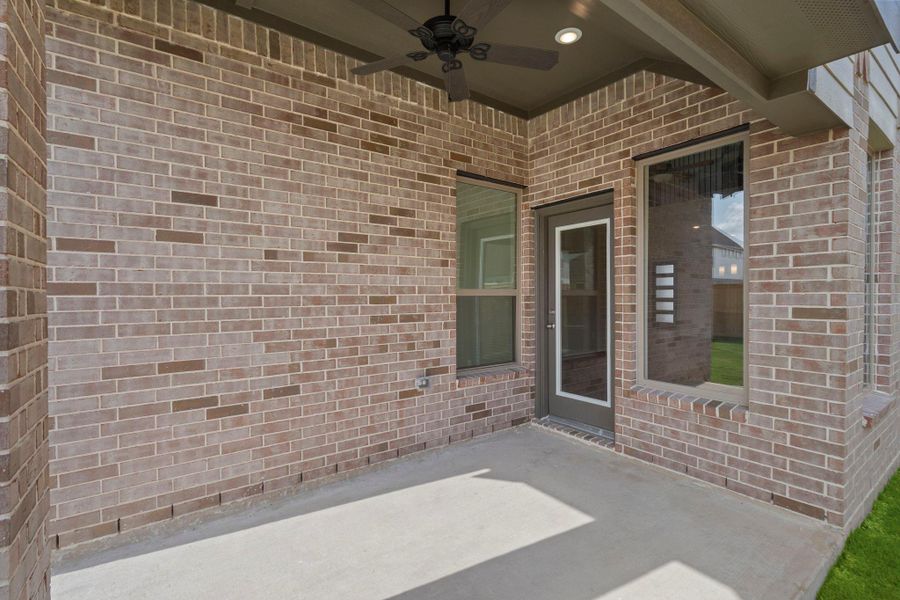 Exterior details and patio area of a home in Bridgeland 40', Cypress (Image 4).