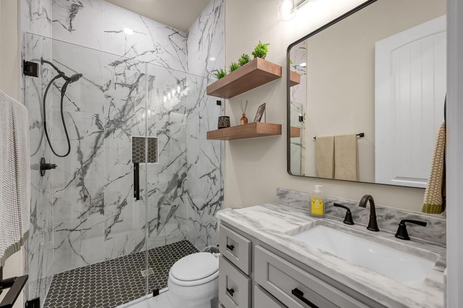 This bedroom also has a full bathroom.