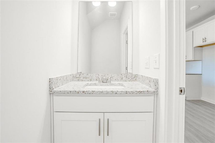 Furnished interior view inside a new home in The Cottages at East Lanier, Fairburn (Image 4).