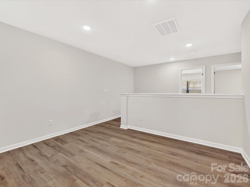 Spacious, unfurnished interior of a new home in North Creek Village, Huntersville (Image 19).