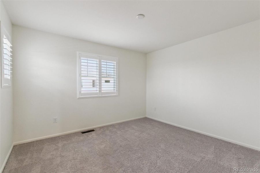 Spacious, unfurnished interior of a new home in Painted Prairie Villas, Aurora (Image 9).