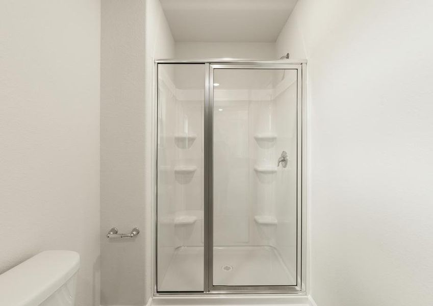 This bathroom has a glass-enclosed shower.