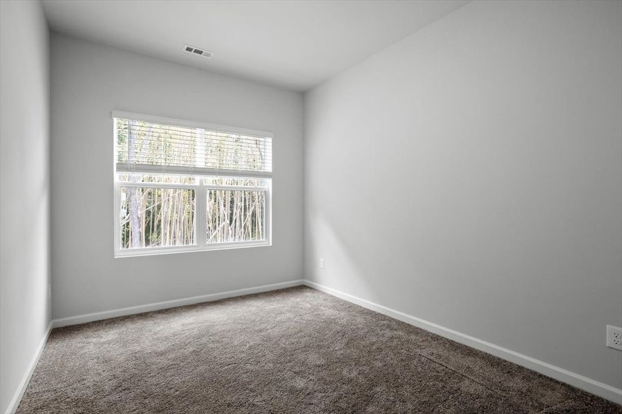Spacious, unfurnished interior of a new home in West Main Townhomes, Sanford (Image 23).