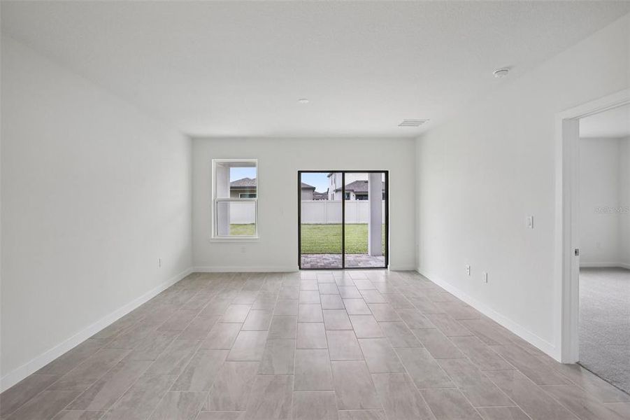 Spacious, unfurnished interior of a new home in Grasslands West, Lakeland (Image 39).