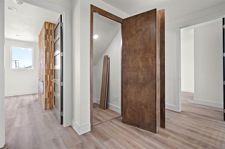 The property features light-colored laminate flooring, white walls, and white trim throughout the interior The property features light-colored laminate flooring, white walls, and white trim throughout the interior