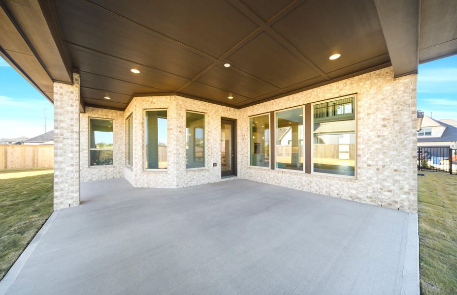 Exterior details and patio area of a home in Bridgeland 60′, Cypress (Image 25).