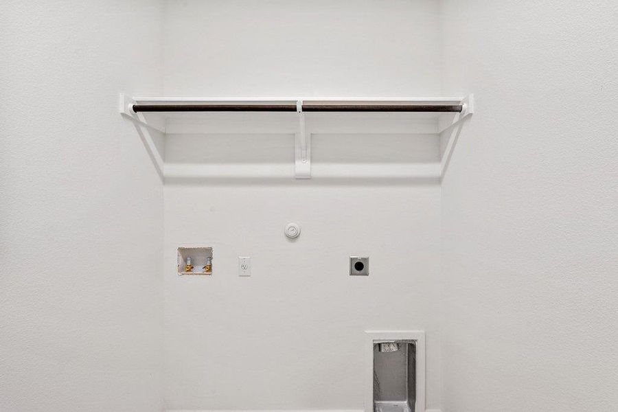 Laundry room with gas dryer hookup, hookup for a washing machine, and electric dryer hookup
