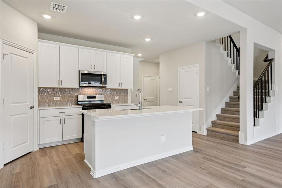 Furnished interior view inside a new home in Parks at Foster Crossing - Signature Series, Anna (Image 6).